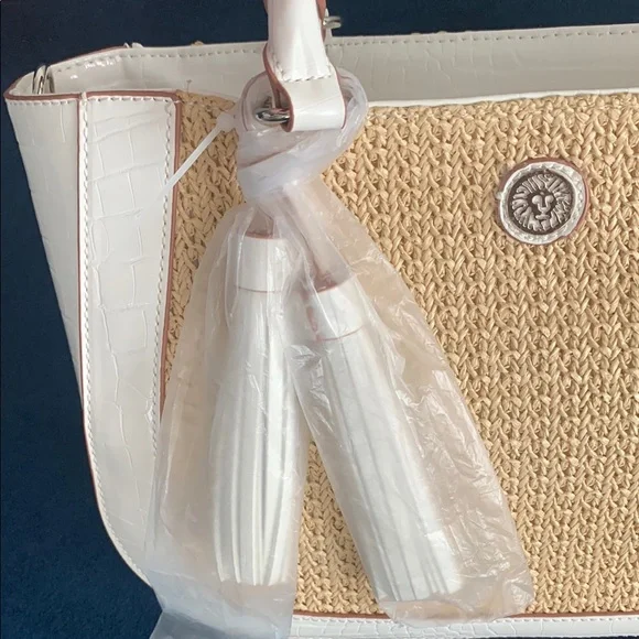 Anne Klein White and Tan Satchel with Chic Tassel with shoulder strap. - Picture 5 of 10